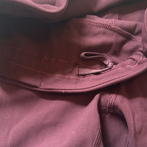 Lululemon Leggings Burgundy. Pockets on side & drawstring in waist. - Picture 3 of 3
